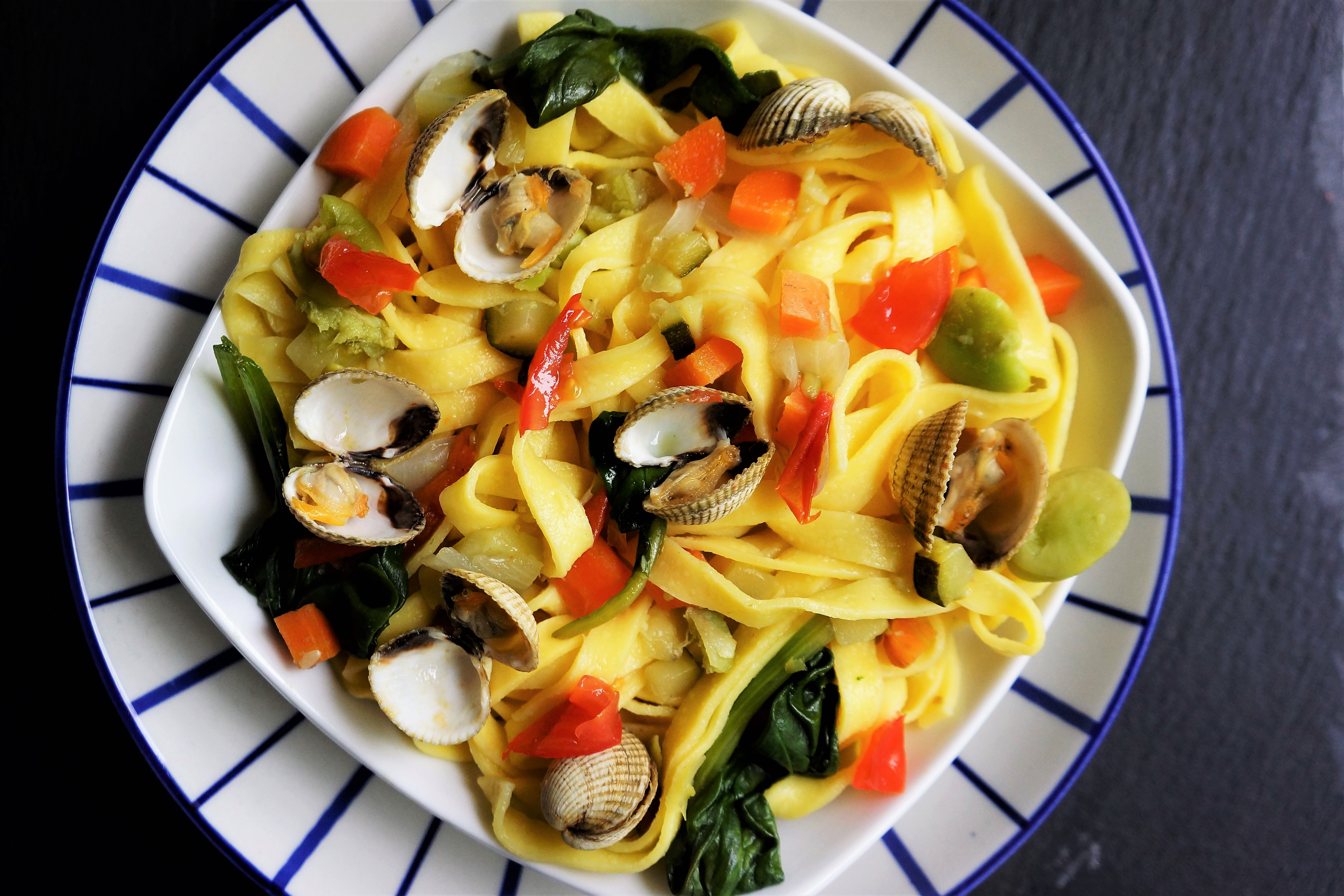 tagliatelles coques et petits légumes toque et tablier